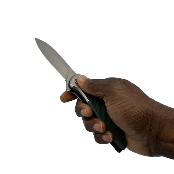 Someone holding 3.75″ Spring-Assisted Folding Knife with Drop Point Blade – robust one-handed deployment knife featuring a 3.75″ stainless steel drop-point blade (approx. 3 mm thick), axis- or liner-lock mechanism, spring-assisted opening, and pocket clip—balances everyday carry convenience with reliable performance, in white background.