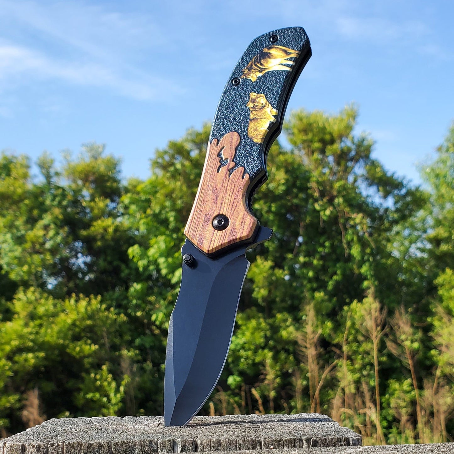 8-Inch Wildlife Folding Knife – classic spring-assisted folding knife featuring a 3.25" 420C stainless steel blade and wildlife-themed handle, designed for everyday carry and outdoor use, stabbed into wood, in sunny nature background.