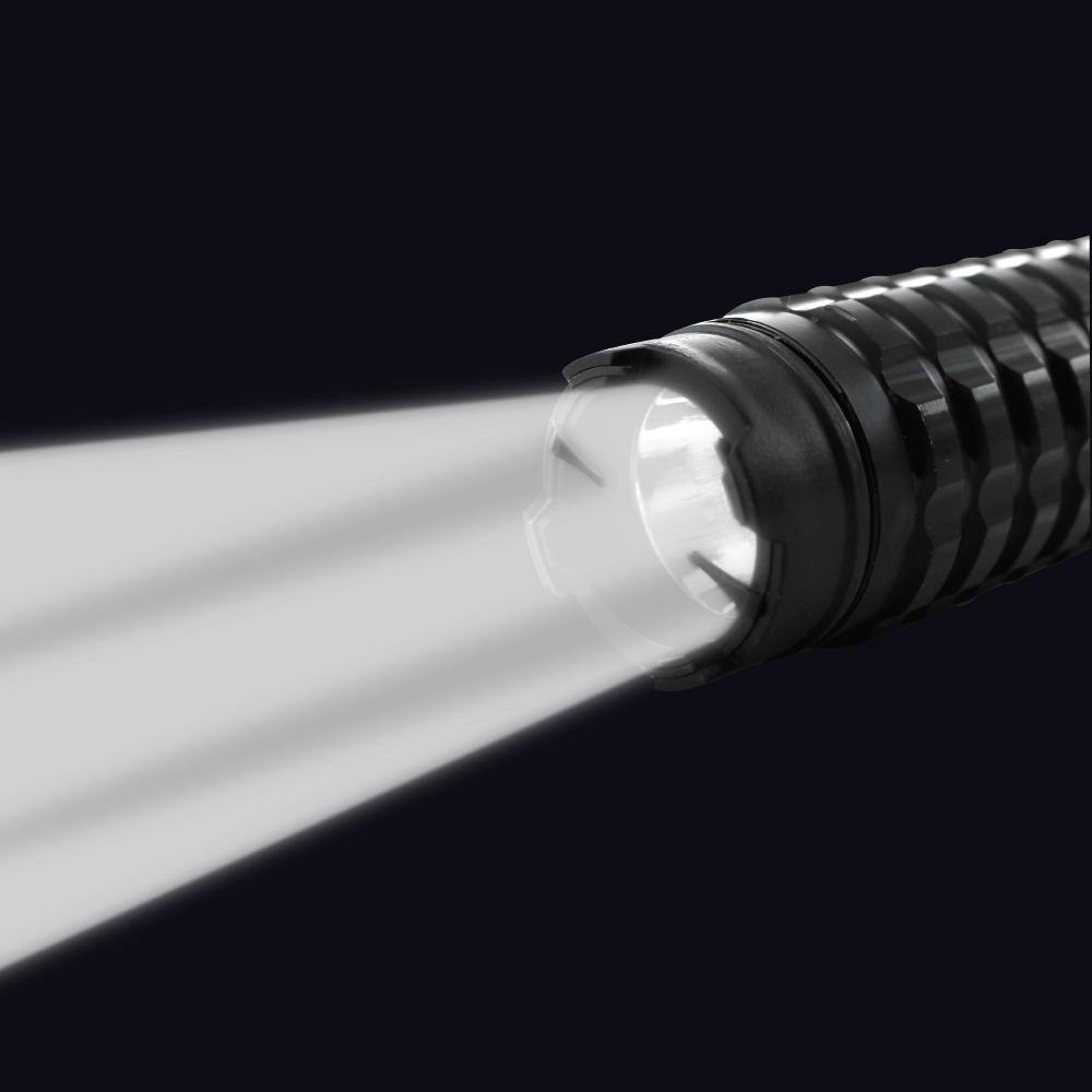 Attitude Adjuster 30,000,000 stun baton flashlight with textured grip and built-in LED light on black background.