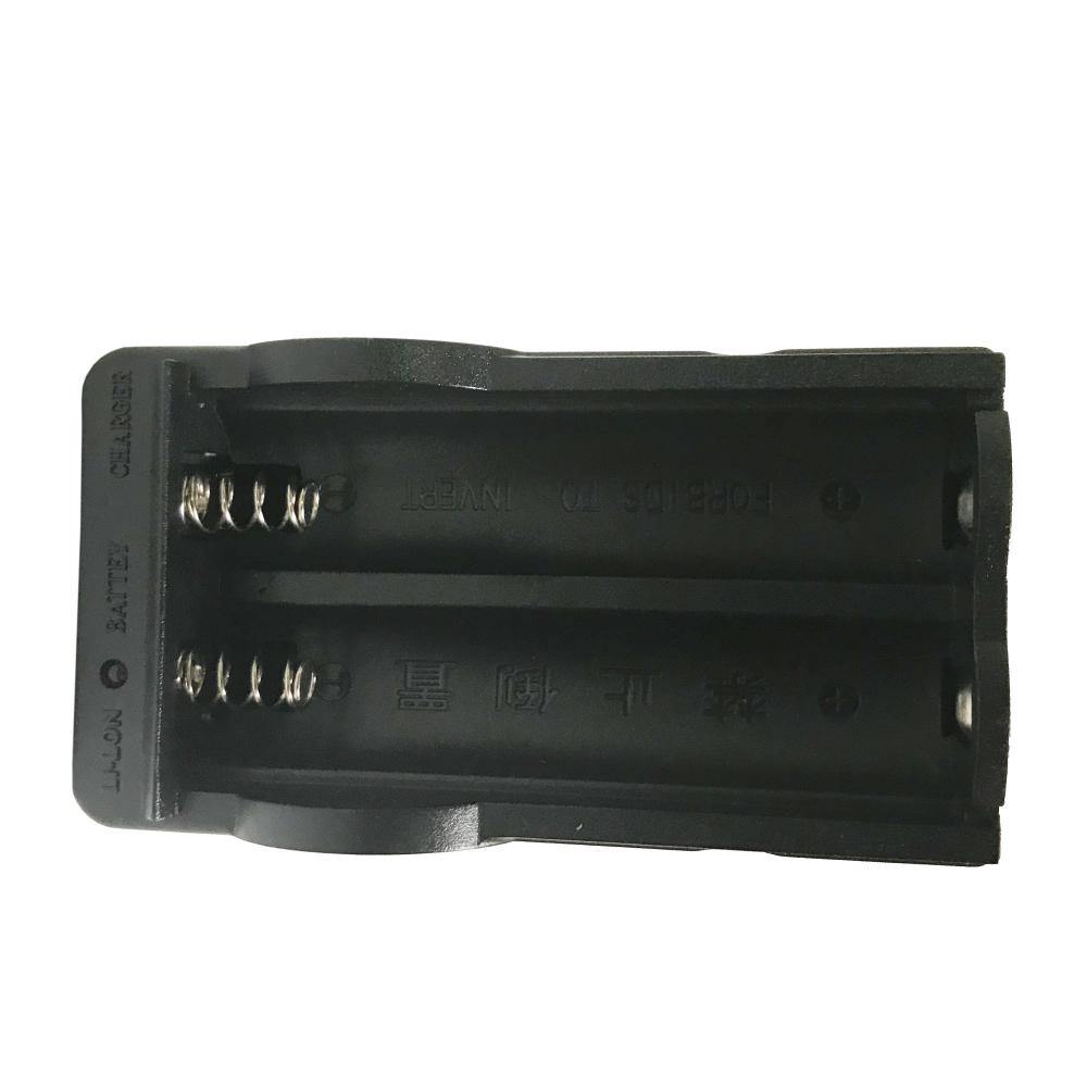 Double Battery Charger 3.7 V Li-ion - compact charger designed to recharge two 3.7-volt lithium-ion batteries simultaneously for flashlights and electronic devices, in white background.