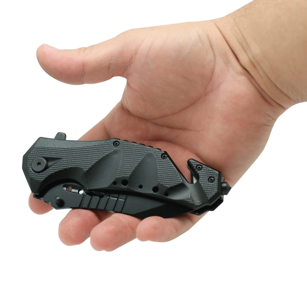 Someone holding Military Grade 9" Tactical Rescue Knife - heavy-duty folding knife featuring a seatbelt cutter and glass breaker, built for tough emergency and tactical situations, in white background.
