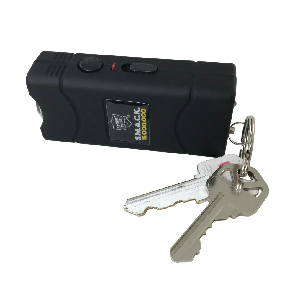 Streetwise Self‑Defense Keychain Combo – compact personal safety tool that combines a loud 130 dB alarm, LED flashlight, and shock delivery device on a keychain, designed for convenient everyday carry and quick access in emergencies, in white background.