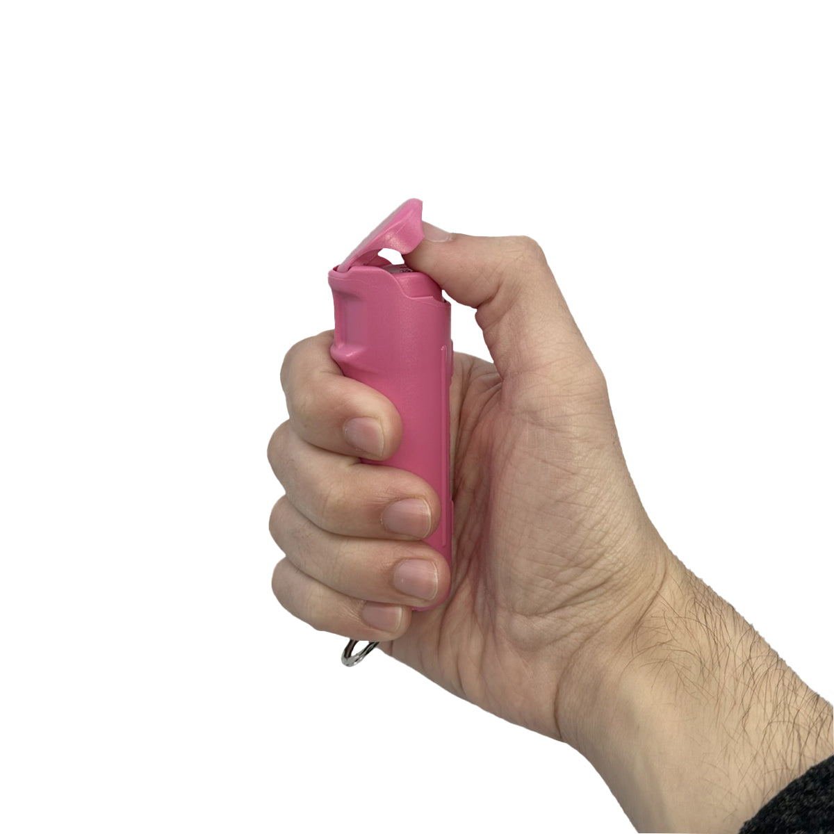 Someone holding Streetwise Self‑Defense Keychain Combo – compact personal safety tool that combines a loud 130 dB alarm, LED flashlight, and shock delivery device on a keychain, designed for convenient everyday carry and quick access in emergencies, in white background.