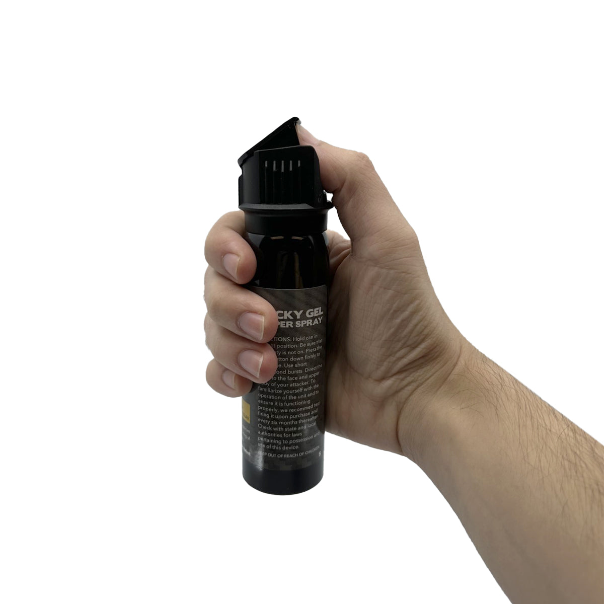 Someone holding Streetwise Sticky Gel Pepper Spray – police-strength gel formula that adheres to the target for extended effect, wind-resistant, flips-top safety, 4 oz canister with up to 15 ft range, and includes dye for identification, in white background.