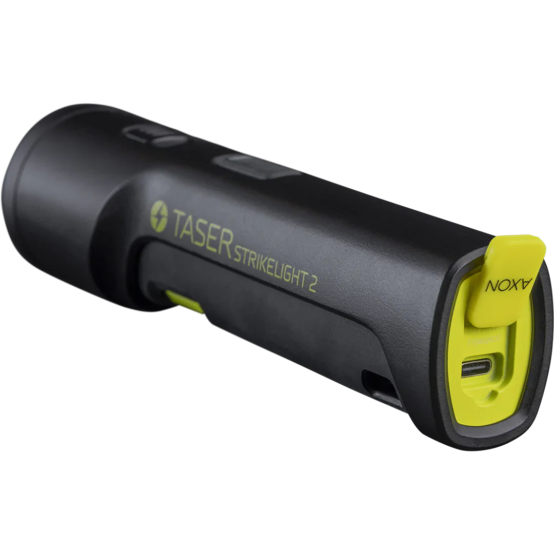 TASER StrikeLight 2 Kit – versatile self-defense flashlight featuring a 700-lumen beam, built-in stun capability, audible arc warning, and USB-C charging for everyday protection, in checkered background.