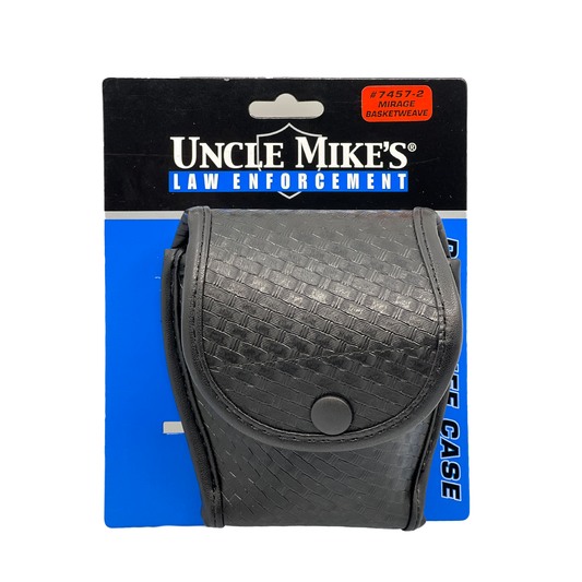 Basketweave Heavy Duty Cuff Holster – durable leather holster with a basketweave finish, designed to securely hold standard chain or hinged handcuffs on a duty belt, in white background.
