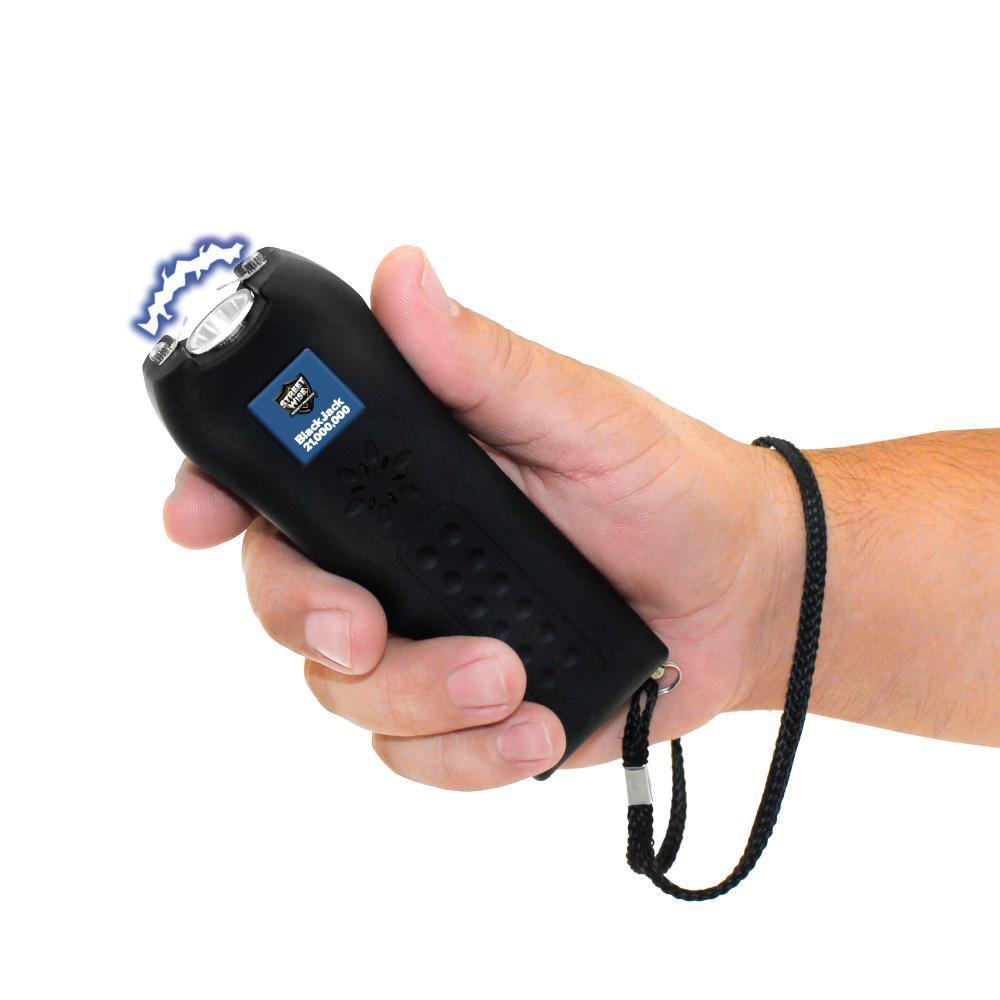 Someone holding Black Jack 21,000,000 Stun Gun - powerful and compact self-defense tool with an ergonomic grip, designed for quick access and reliable stopping power, in white background.
