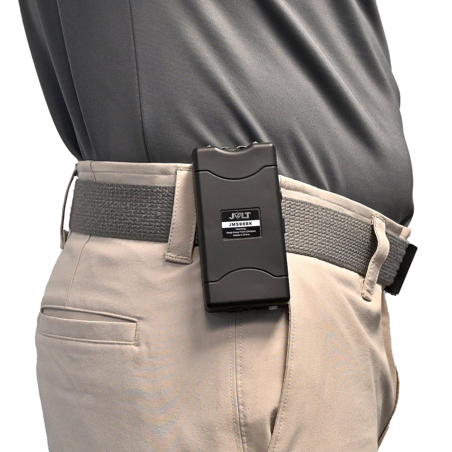 Someone carrying Mini 68,000,000 Stun Gun – ultra-compact and powerful stun device designed for easy concealment and effective personal defense, in white background.