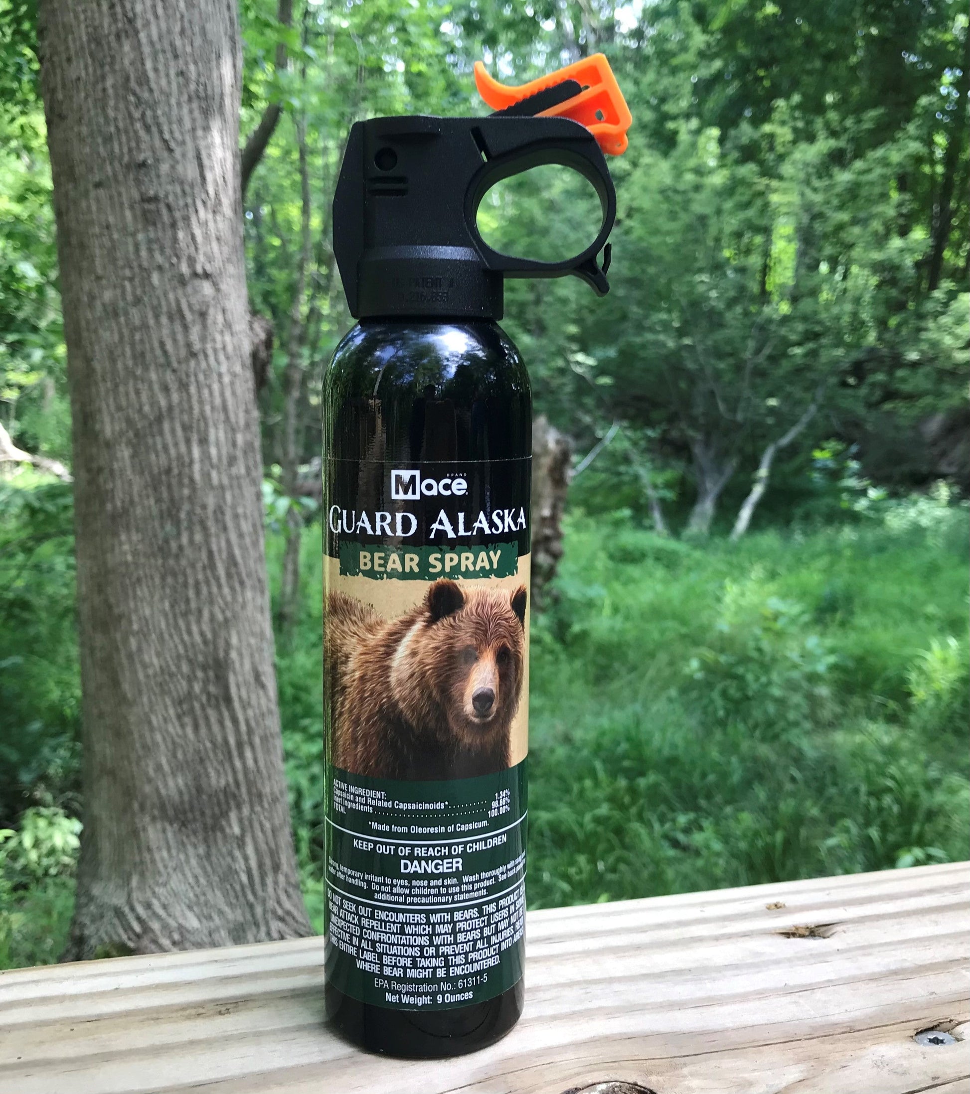 Close-up of Guard Alaska 9oz Firemaster Fogger pepper spray canister with high-capacity nozzle for wide-area animal defense.