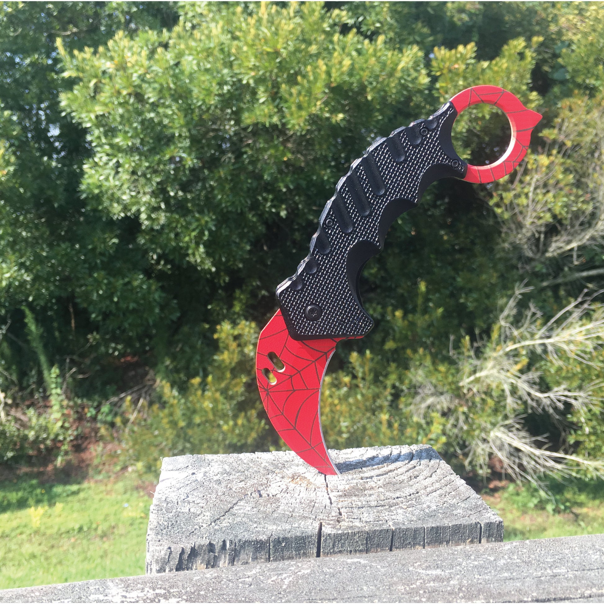 Karambit 5.25" Knife - curved blade folding knife designed for tactical use, featuring an ergonomic handle and a secure grip for self-defense.