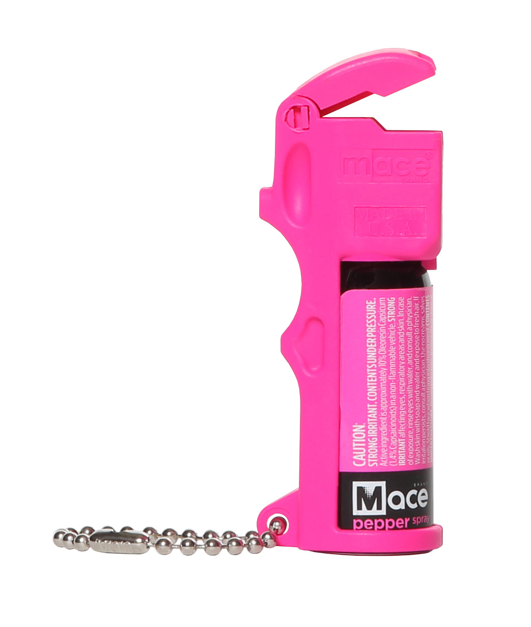 Mace Pocket Model Stream Pepper Spray – compact self-defense spray with a focused stream pattern delivering up to 10 ft of range, flip-top safety cap, finger-grip design, and UV dye for attacker identification, in white background.