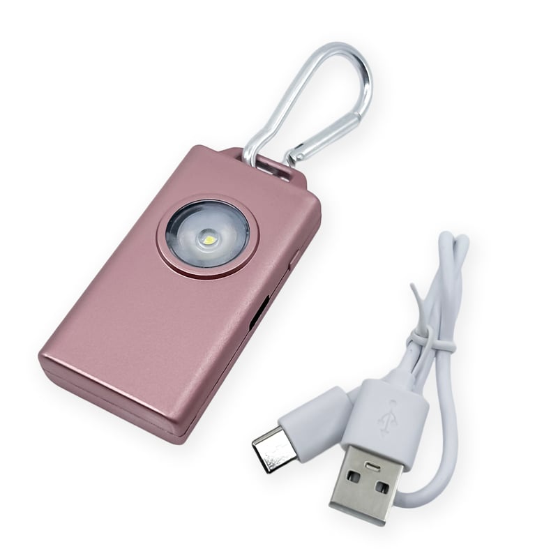 Micro Guard™ Plus Personal Alarm with COB LED Flashlight – compact personal safety device combining a 130 dB alarm and a COB LED floodlight, featuring a keychain loop and USB‑C rechargeable battery for everyday carry, in white background.