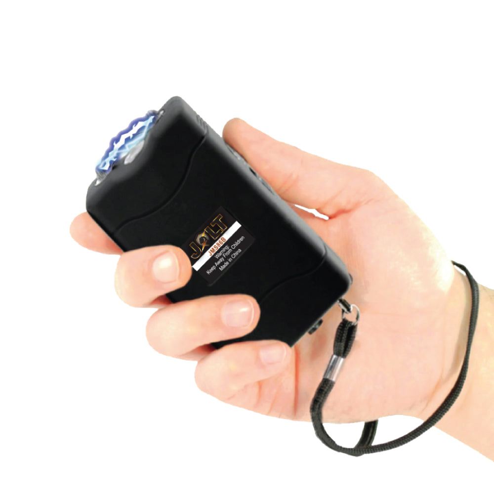 Someone holding Mini 86,000,000 Stun Gun - ultra-compact and powerful self-defense device designed for easy concealment fand quick access in emergency situations, in white background.