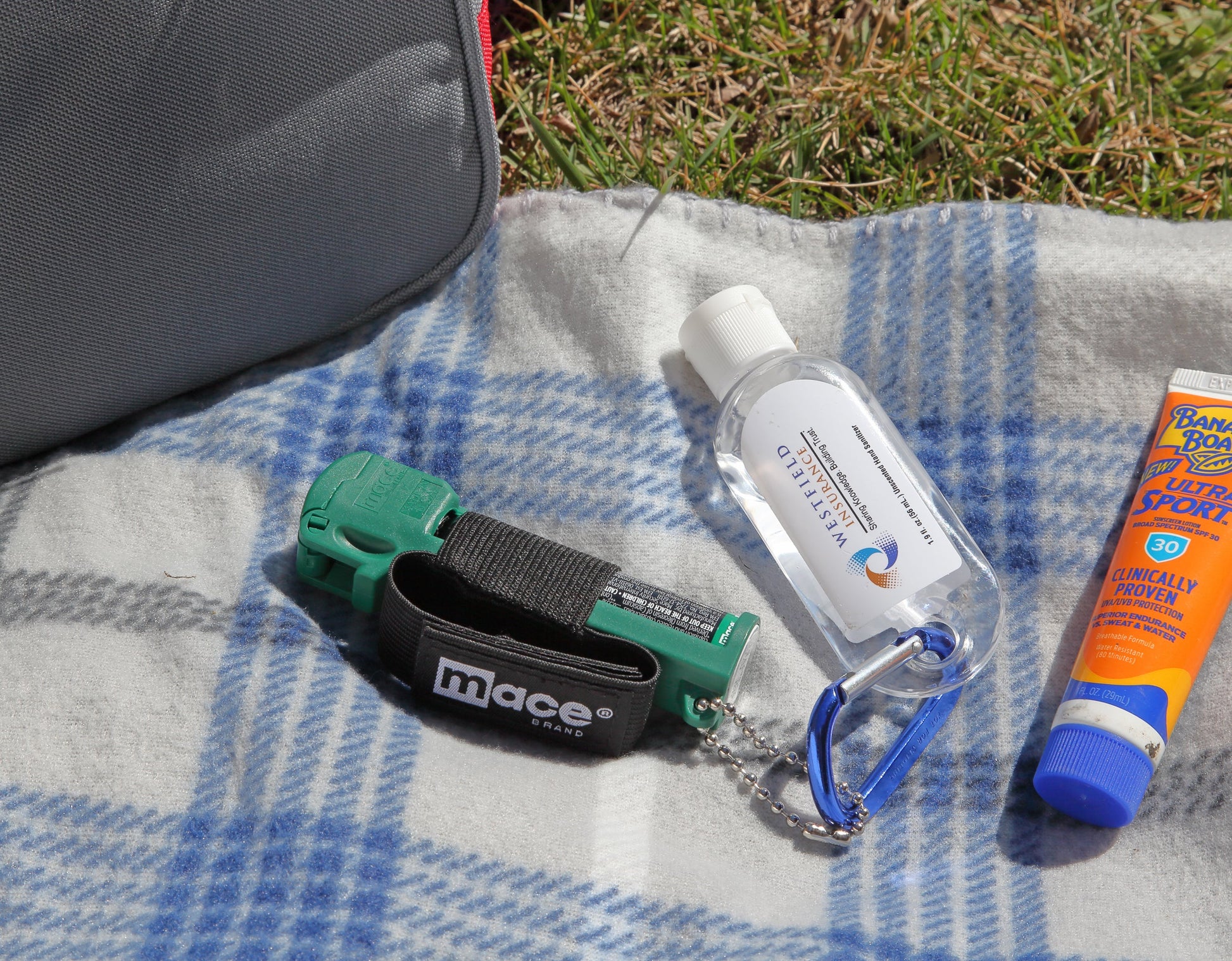 Muzzle Dog Repellent Pepper Spray – compact, canine-safe pepper spray with a stream delivery system reaching up to 10 ft, flip-top safety cap, finger-grip design, keychain attachment, and adjustable strap for hands-free use during walks or jogging, in outdoor setting.