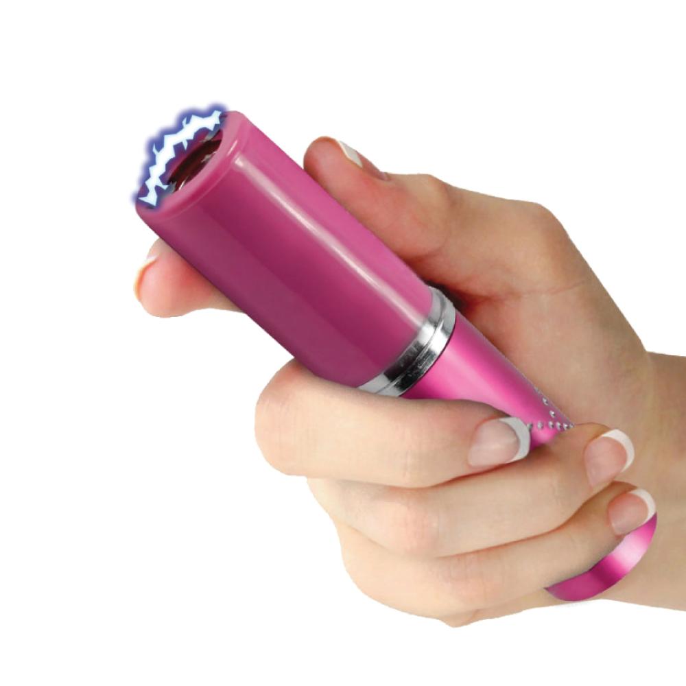 Someone holding Perfume Protector 17,000,000 Stun Gun - discreet self-defense tool in a perfume-style design with built-in safety switch, in white background.