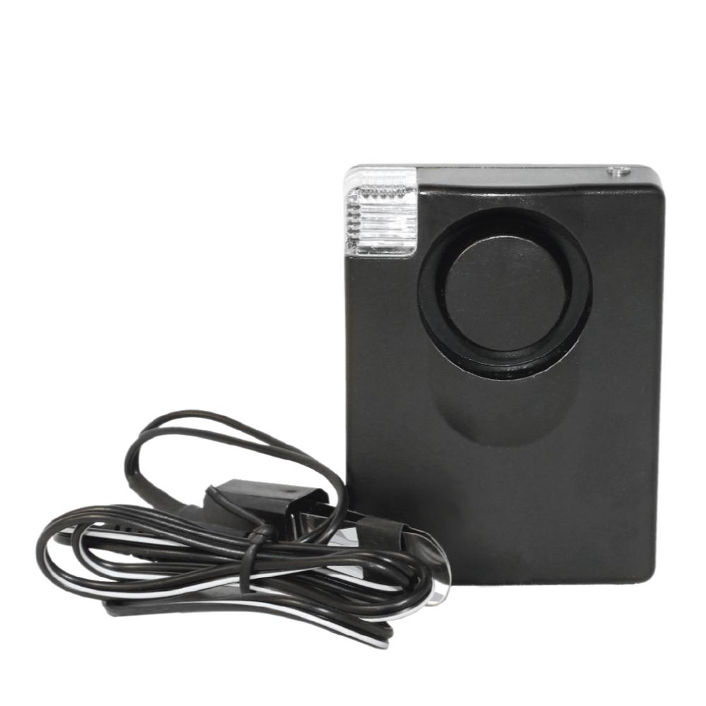 Compact personal door alarm with built-in LED light, ideal for home or travel security, in white background.