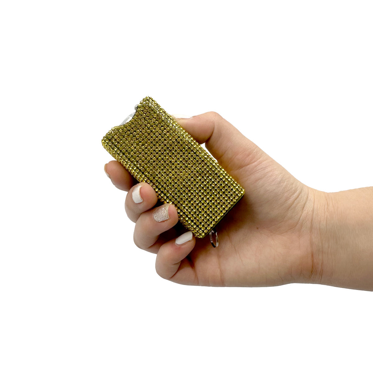 Someone holding Streetwise Rhinestun Keychain Stun Gun – compact mini stun gun with stylish rhinestone exterior, built-in LED flashlight, micro-USB rechargeable battery, dual-safety switch, keyring attachment, and nylon holster; delivers powerful high-voltage shock in a fashion-forward design, in white background.