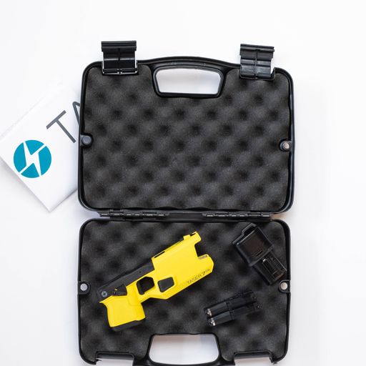 Product case for Taser 7 CQ - close-quarters conducted energy weapon designed for law enforcement and personal defense, providing effective stopping power at short range, in white background.