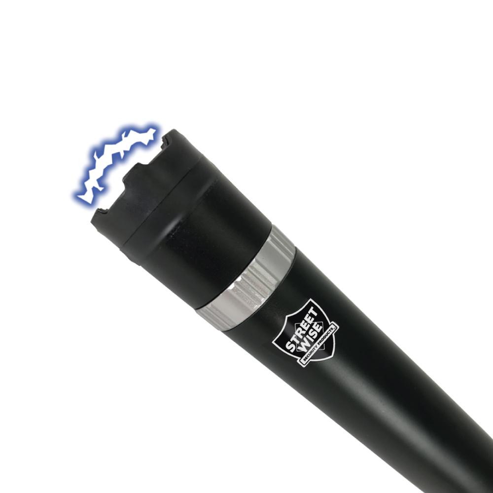 Triple Defender 27,000,000* Stun Baton Flashlight with integrated light and rubberized grip, ideal for personal security and law enforcement use.